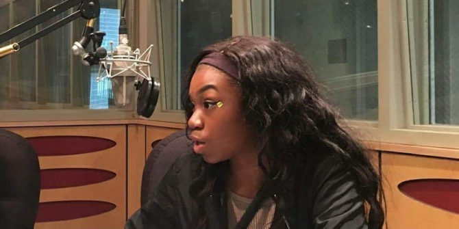youth leader at the microphone for a radio station